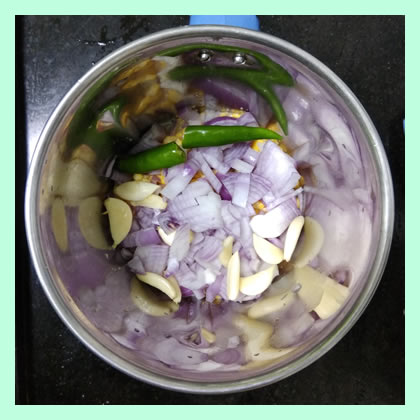 grinding-prawn-vadai-mix-base-adding-garlic-and-onion