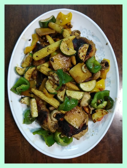 mustard-chicken with veggies in a large plate